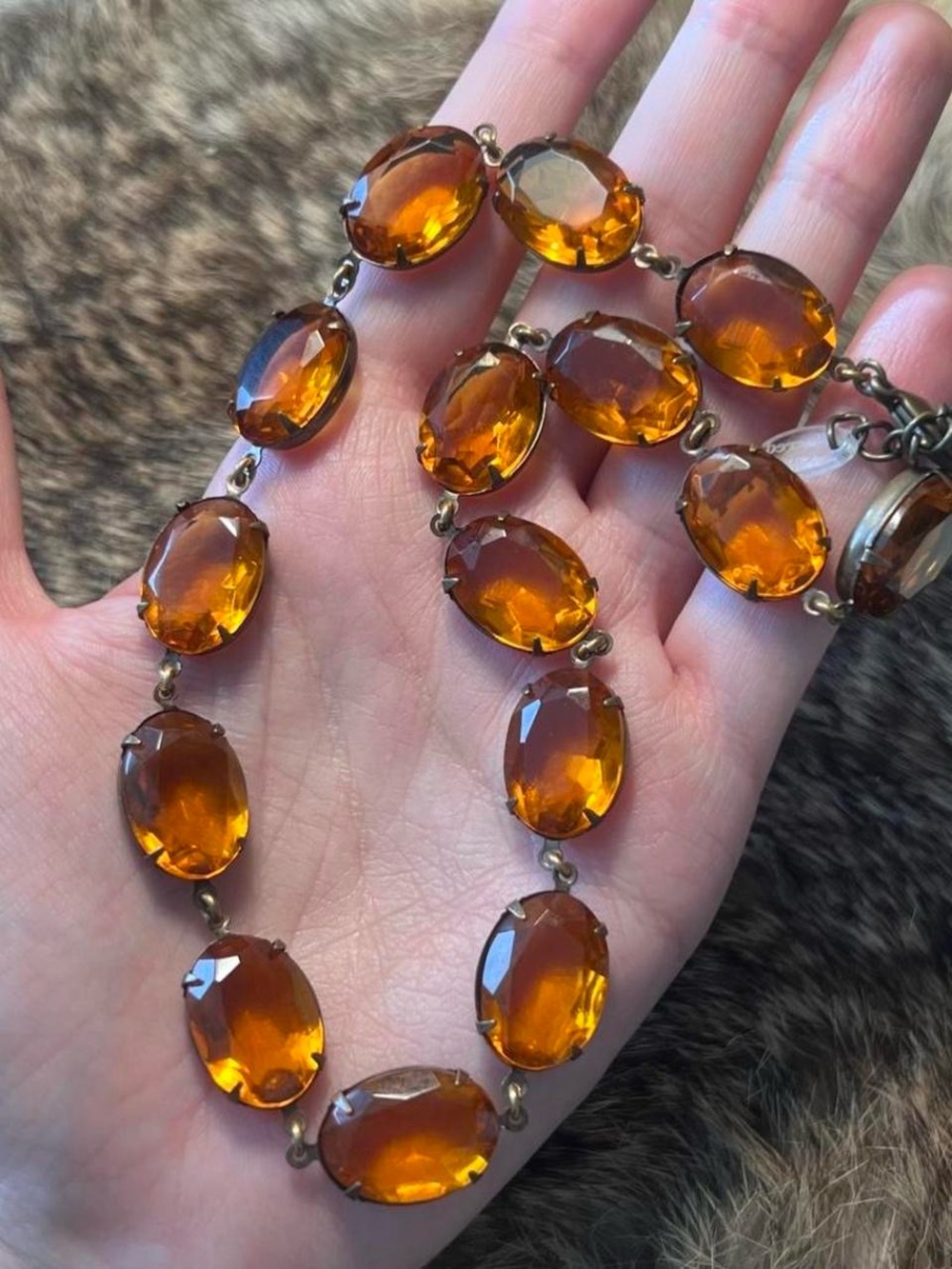 Gold toned Sacred Cake reproduction faux gemstone necklace